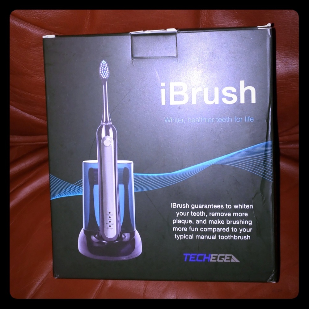 IBrush toothbrush system New in box